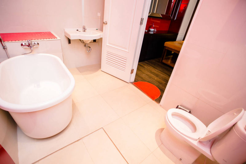 Bathroom with bathtub and decor